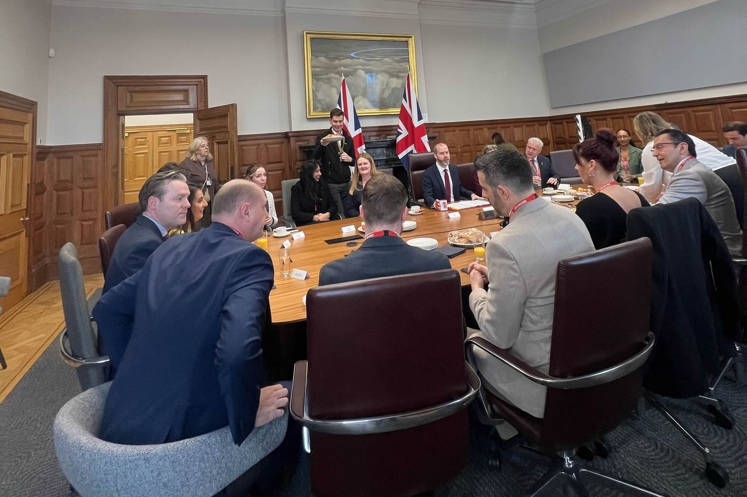 Claire Witz of Chimpology meeting with the British Government Minister for Business and Trade